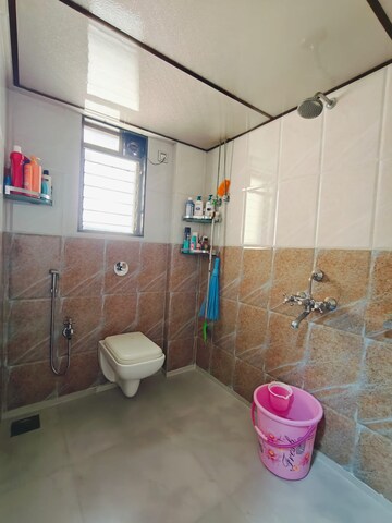 Bathroom in 1 BHK Apartment at Nightingale CHS, Kandivali West – for Rent