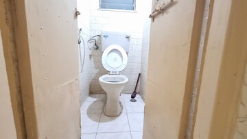 Bathroom in 1 BHK Apartment at Nightingale CHS, Kandivali West – for Rent