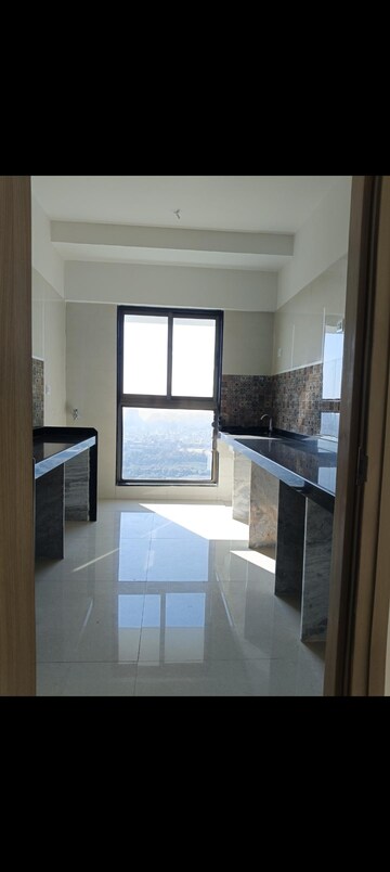 Kitchen in 2 BHK Apartment at Rajesh Raj Infinia, Malad West – for Rent