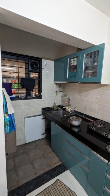 Kitchen in 2 BHK Apartment at Kohinoor Zen Estate, Kharadi – for Rent