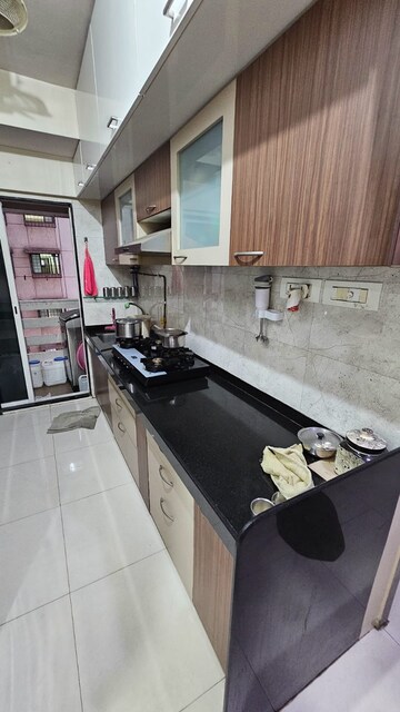 Kitchen in 2 BHK Apartment at Delta Vrindavan, Mira Road – for Sale