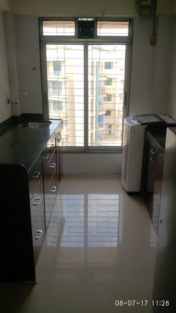 Kitchen in 1 BHK Apartment at Deepak Daffodils, Andheri East – for Rent