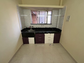 Kitchen in 2 BHK Apartment at Spring Glory Co-Operative Society, Kharadi – for Rent