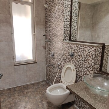Bathroom in 3 BHK Apartment at Omkar Alta Monte, Malad East – for Rent