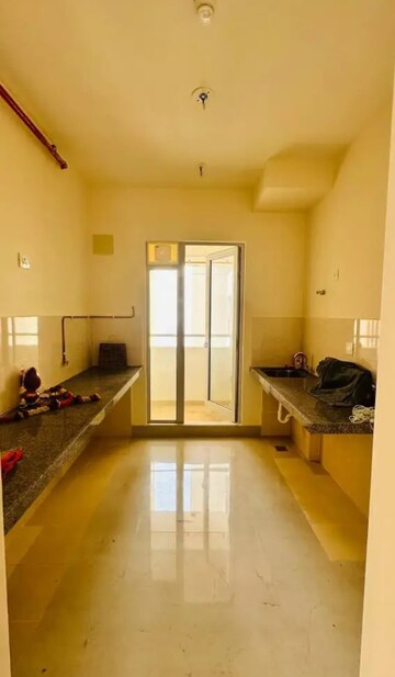 Kitchen in 2 BHK Apartment at Piramal Vaikunth, Balkum Pada – for Rent