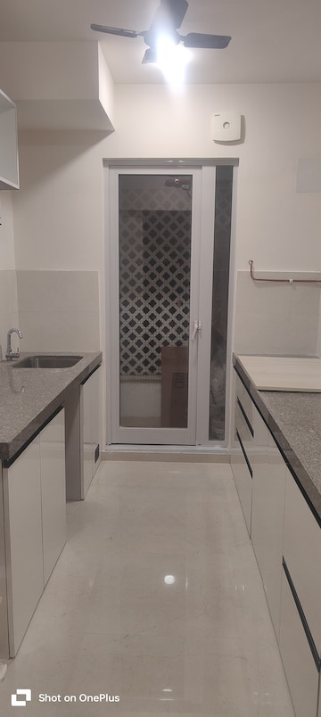 Kitchen in 2 BHK Apartment at Piramal Vaikunth, Balkum Pada – for Rent