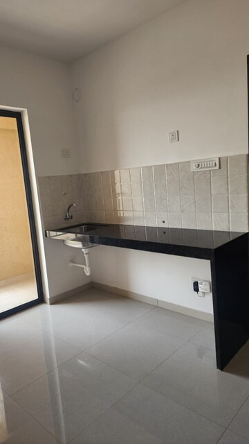 Kitchen in 1 BHK Apartment at Shapoorji Pallonji Joyville Hadapsar Annexe, Sp Infocity – for Sale