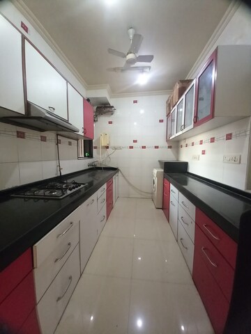Kitchen in 3 BHK Apartment at Lokhandwala Whispering Palms, Kandivali East – for Rent