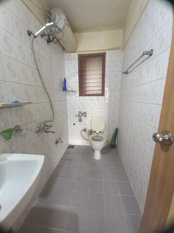 Bathroom in 3 BHK Apartment at Lokhandwala Whispering Palms, Kandivali East – for Rent