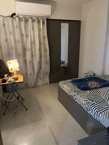 Bedroom in 2 BHK Apartment at Dosti West County Phase 2 Dosti Cedar, Balkum Pada – for Rent