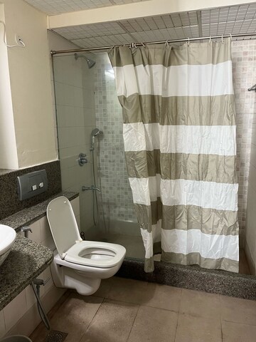 Bathroom in 3 BHK Apartment at Parsvnath Exotica, Sector 53 – for Rent