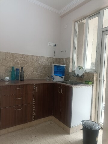 Kitchen in 2.5 BHK Apartment at Amrapali Golf Homes, Sector 4, Greater Noida – for Sale