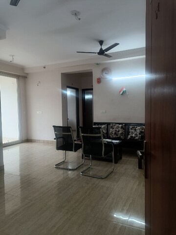 Living Room in 2.5 BHK Apartment at Amrapali Golf Homes, Sector 4, Greater Noida – for Sale