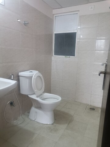 Bathroom in 2.5 BHK Apartment at Amrapali Golf Homes, Sector 4, Greater Noida – for Sale