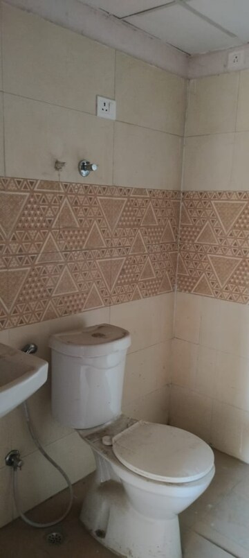 Bathroom in 3 BHK Apartment at Amrapali Golf Homes, Sector 4, Greater Noida – for Sale