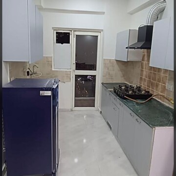Kitchen in 2 BHK Apartment at Aims Golf City, Noida Central – for Rent