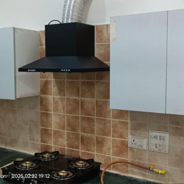 Kitchen in 2 BHK Apartment at Aims Golf City, Noida Central – for Rent
