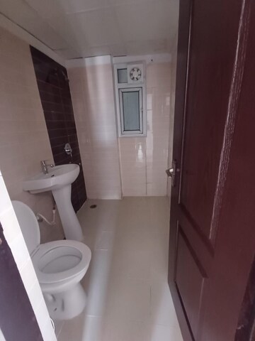 Building Lobby in 3 BHK Apartment at Amrapali Golf Homes, Sector 4, Greater Noida – for Sale