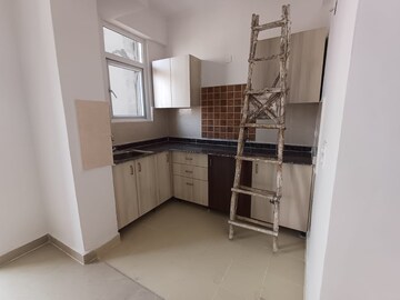 Kitchen in 3 BHK Apartment at Amrapali Golf Homes, Sector 4, Greater Noida – for Sale