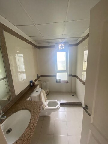 Bathroom in 3 BHK Apartment at Unitech The Close North, Sector 50 – for Rent