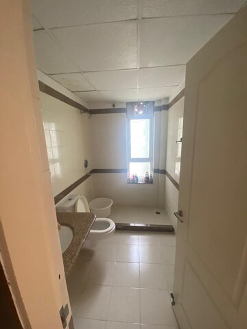 Bathroom in 3 BHK Apartment at Unitech The Close North, Sector 50 – for Rent