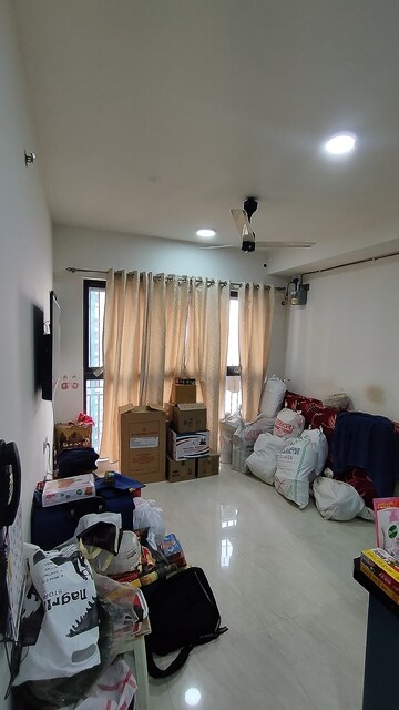 Living Room in 2 BHK Apartment at Lodha Crown Quality Homes, Majiwada – for Rent