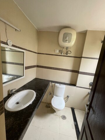 Bathroom in 3 BHK Apartment at Unitech Uniworld Gardens 2, Sector 47 – for Rent