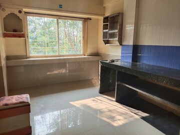 Kitchen in 3 BHK Apartment at Oberoi Sky City, Borivali East – for Rent