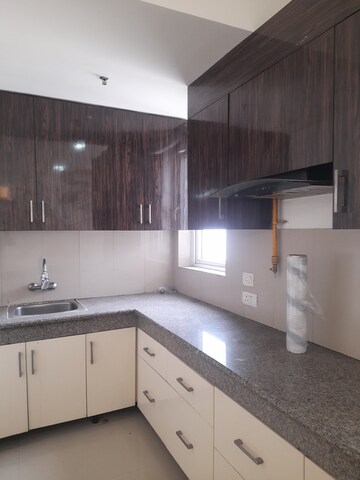 Kitchen in 2 BHK Apartment at Emaar MGF The Palm Drive Studios, Sector 66 – for Rent