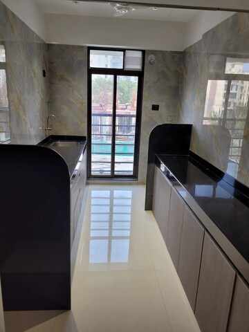 Kitchen in 1 BHK Apartment at Vikas Ritz, Khadakpada – for Sale