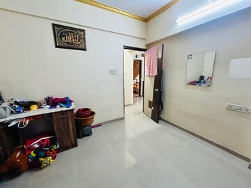 Living Room in 2 BHK Apartment at Seawoods – for Rent