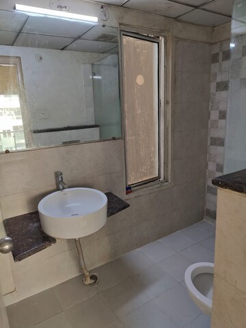 Bathroom in 3 BHK Apartment at Gaurs Cascades, Raj Nagar Extension – for Rent
