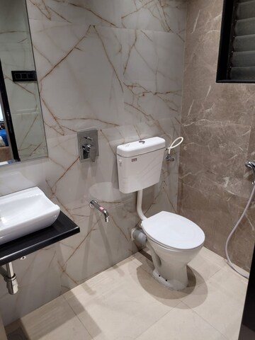 Bathroom in 3 BHK Apartment at Vikas Ritz, Khadakpada – for Sale