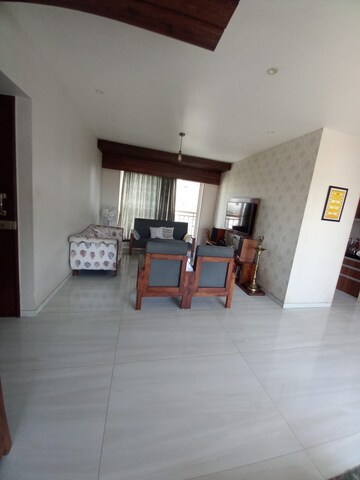 Living Room in 2 BHK Apartment at Amrapali Golf Homes, Sector 4, Greater Noida – for Sale