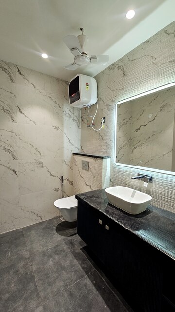 Bathroom in 4 BHK Builder Floor at Omaxe Designer Villas Mayfield Garden, Sector 51 – for Sale