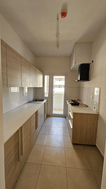 Kitchen in 1 BHK Apartment at Bhartiya Nikoo Homes, Thanisandra Main Road – for Rent