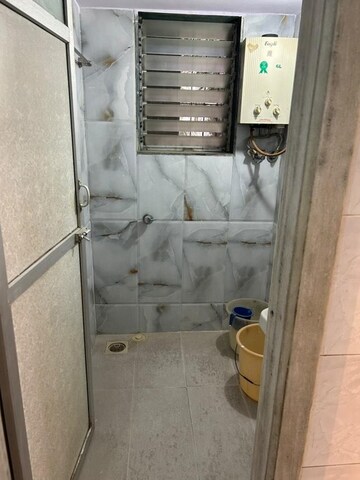 Bathroom in 1 BHK Apartment at River Park Complex, Dahisar East – for Sale