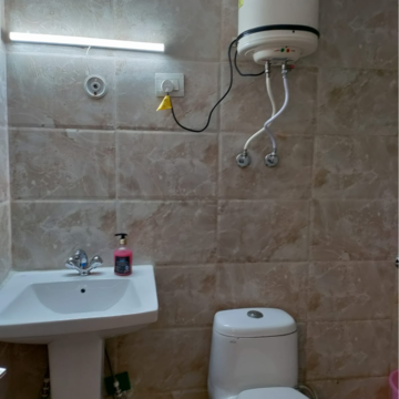 Bathroom in 1 RK Apartment at Supertech Czar Suites, Omicron I Greater Noida – for Rent