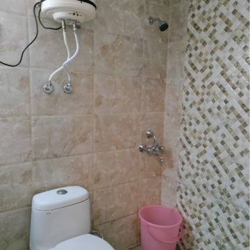 Bathroom in 1 RK Apartment at Supertech Czar Suites, Omicron I Greater Noida – for Rent