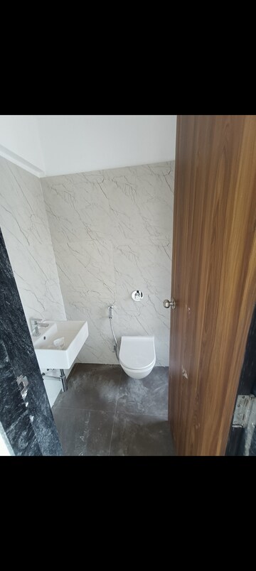 Bathroom in 2 BHK Apartment at Omkar Signet, Malad East – for Rent