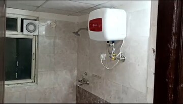 Bathroom in 2 BHK Apartment at Aims Golf City, Sector 75 – for Rent
