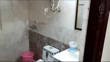 Bathroom in 2 BHK Apartment at Aims Golf City, Sector 75 – for Rent