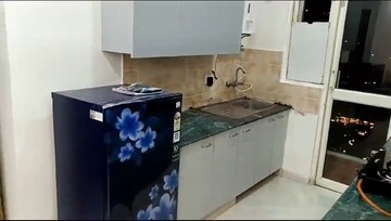 Kitchen in 2 BHK Apartment at Aims Golf City, Sector 75 – for Rent