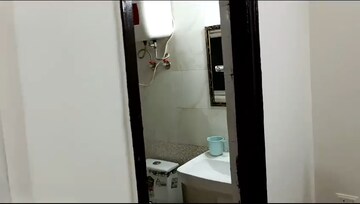Bathroom in 2 BHK Apartment at Aims Golf City, Sector 75 – for Rent