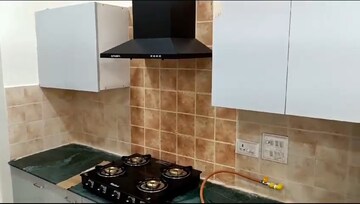 Kitchen in 2 BHK Apartment at Aims Golf City, Sector 75 – for Rent