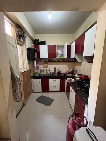 Kitchen in 2 BHK Apartment at SVP Gulmohur Garden, Raj Nagar Extension – for Rent