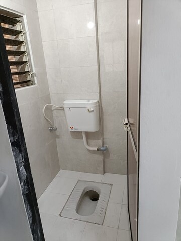 Bathroom in 1 BHK Apartment at Sun Shivaalik Park, Bhadwad Gaon – for Sale