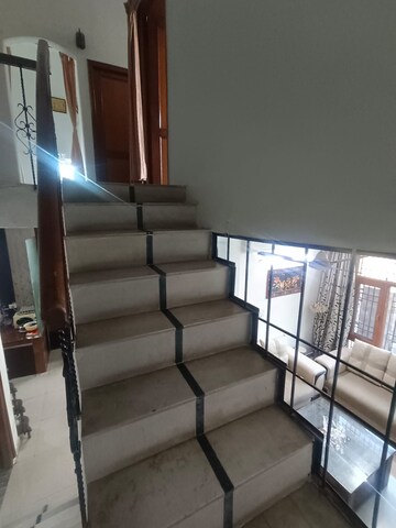 Staircase in 3 BHK Independent House at Dhakoli Village – for Sale