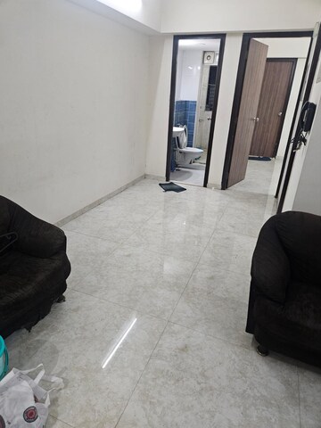 Living Room in 1 BHK Apartment at Lodha Amara, Kolshet Road – for Rent