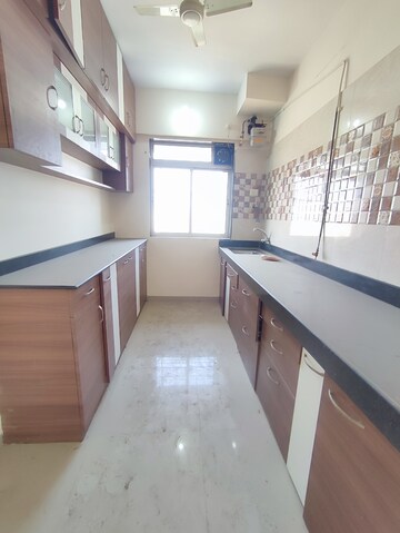Kitchen in 2 BHK Apartment at Vihang Vermont, Ghodbunder Road – for Rent